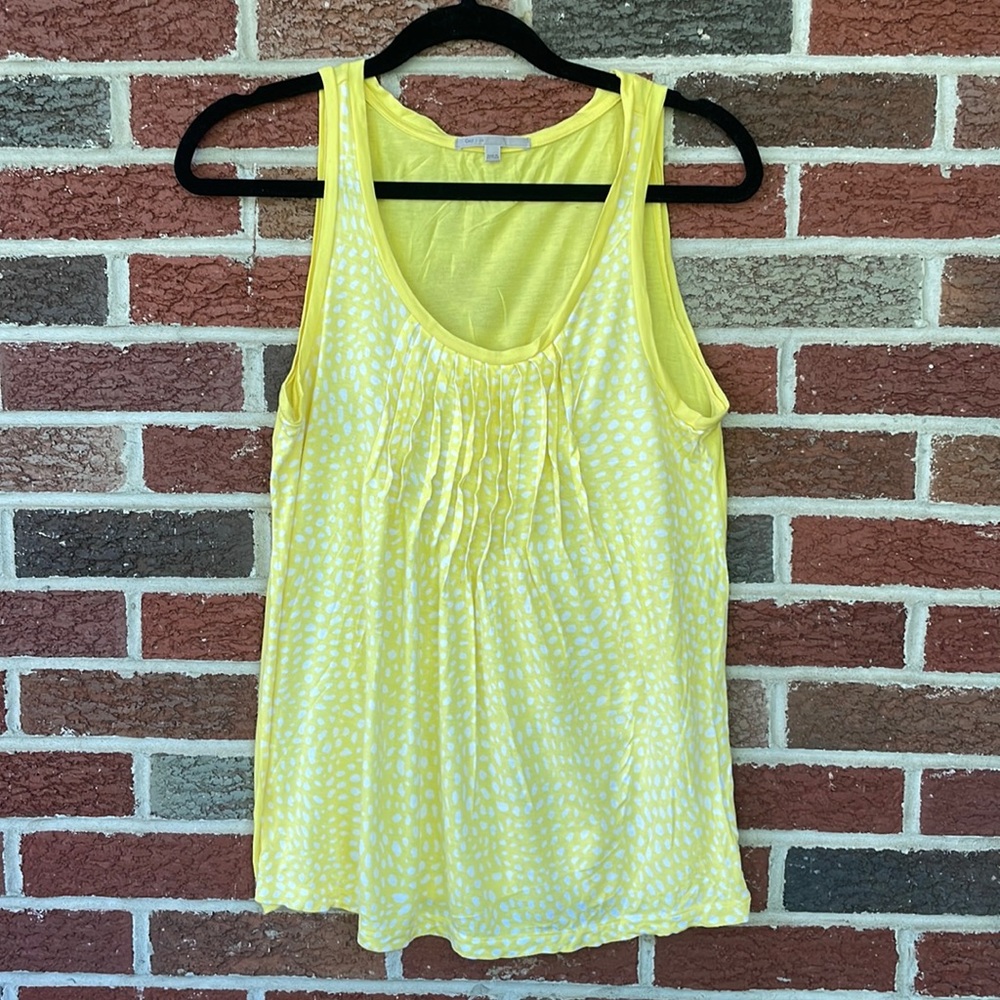 HARDLY USED- Gap (XS) flowy yellow tank with white specks on the front.